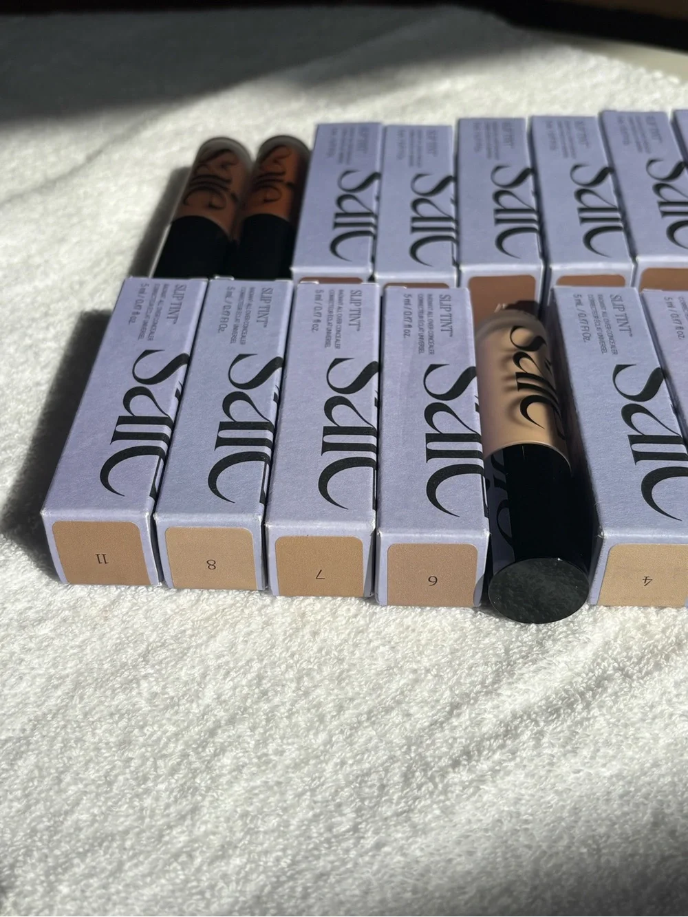 Saie Slip Tint Lipstick Collection — Nude and Warm Brown Shades